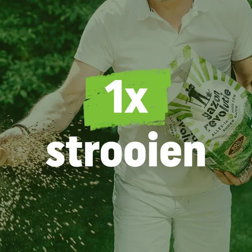 Mestzak voor gazon met groene opdruk '1x strooien', vastgehouden