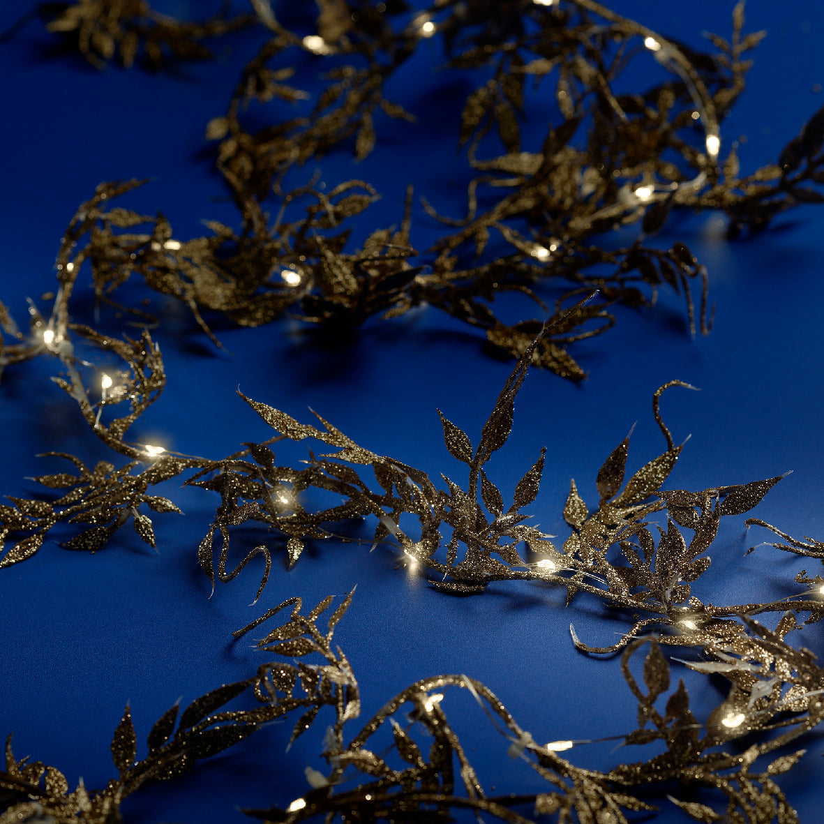 Decoratieve takjeslinger met micro-leds, glanzend goud en warmwit licht