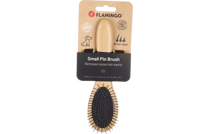 Flamingo Small Pin Brush verpakking met ovale zwarte pinborstel en houten handgreep