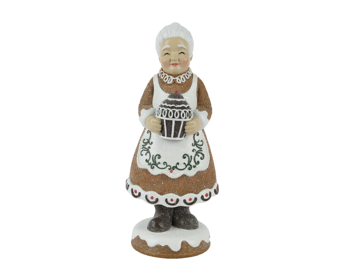 Polyresin beeldje van een dame met witte muts en bruine jurk