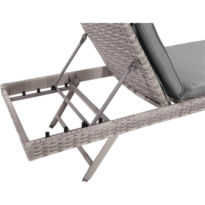 Ligbed zijaanzicht met grijs kussen en vlechtwerk frame, scharnierconstructie