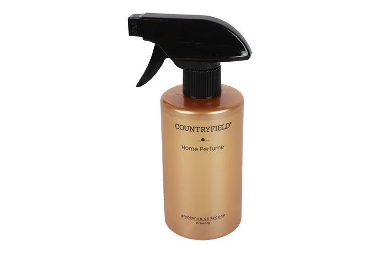 Geurkamerspray in koperkleurige fles met zwarte trigger, label met COUNTRYFIELD