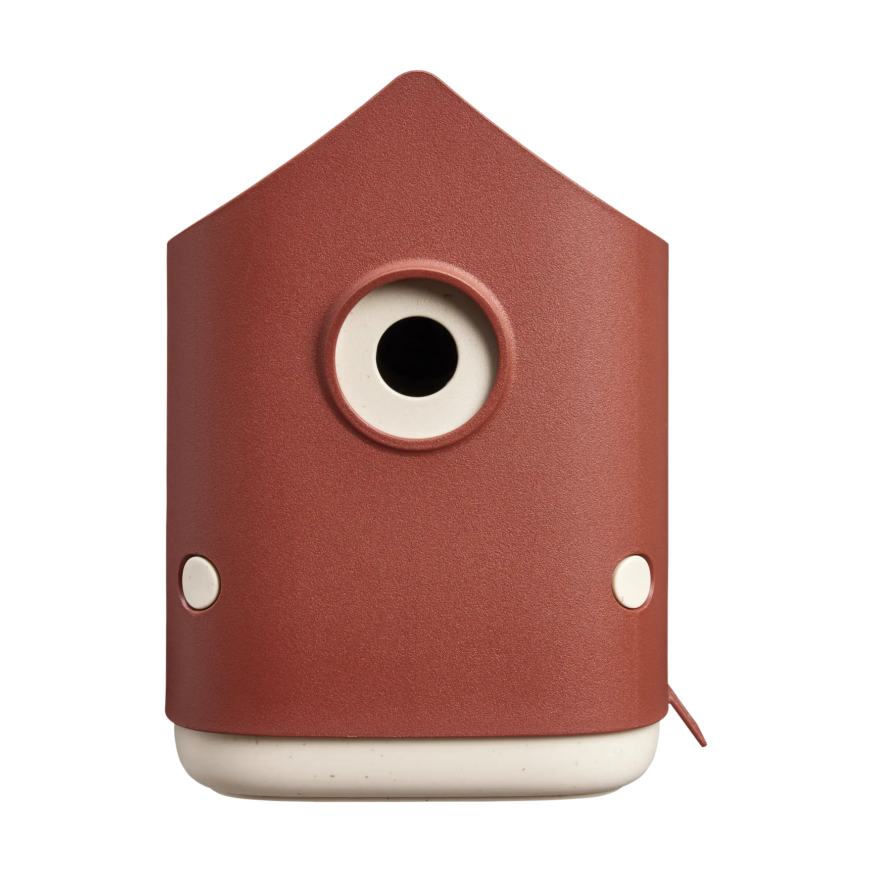 Rood vogelhuis met rond invlieggat met witte rand en ronde openingen links en rechts.