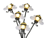 Zonnelamp met metalen bijenarm en meerdere witte bloemkapjes met gele lamp