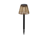 Solar steeklamp met rieten kap en zwarte paal, ronde solar-lampkop bovenaan.