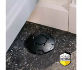 Zwarte ronde mierenlokdoos op vloer, HOME DEFENSE®-logo