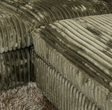 Groene teddy zitting en rugleuning met diepe ribstructuur en afgeronde hoeken
