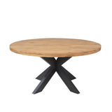 Ronde eettafel met rond houten blad en zwarte metalen spreidpoten
