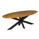 Ovale eettafel met bruintint houten blad en zwarte metalen pootkruis.