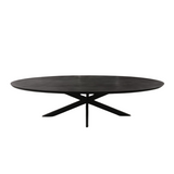 Ovale zwarte eettafel met donker blad en kruisvormig onderstel