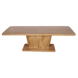Eettafel Voco met rechthoekig naturel houten blad en centrale poot, licht afgerond.