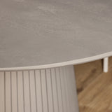 Ronde eettafel met taupekleurige poot met verticale ribben en witte rand