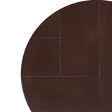 Rond houten tafelblad met donkere houtnerf en zichtbare panelen