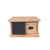 Salontafel met houtkleurig blad en zwarte ladefronten, met open houtkast en lade.