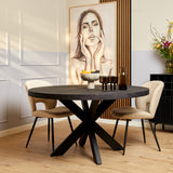Ronde eettafel met donker blad en zwart X-vormig onderstel