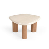 Ronde salontafel met lichtbeige blad en drie houten poten