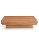 Salontafel van licht eikenhout met afgerond rechthoekig blad en massieve basis