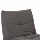 Donkergrijze relaxfauteuil rugleuning en zitting met gestikte panelen en doorlopende lijnen