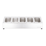 Toppingstation met 5 lege roestvrijstalen bakjes, wit frame met zilveren rand