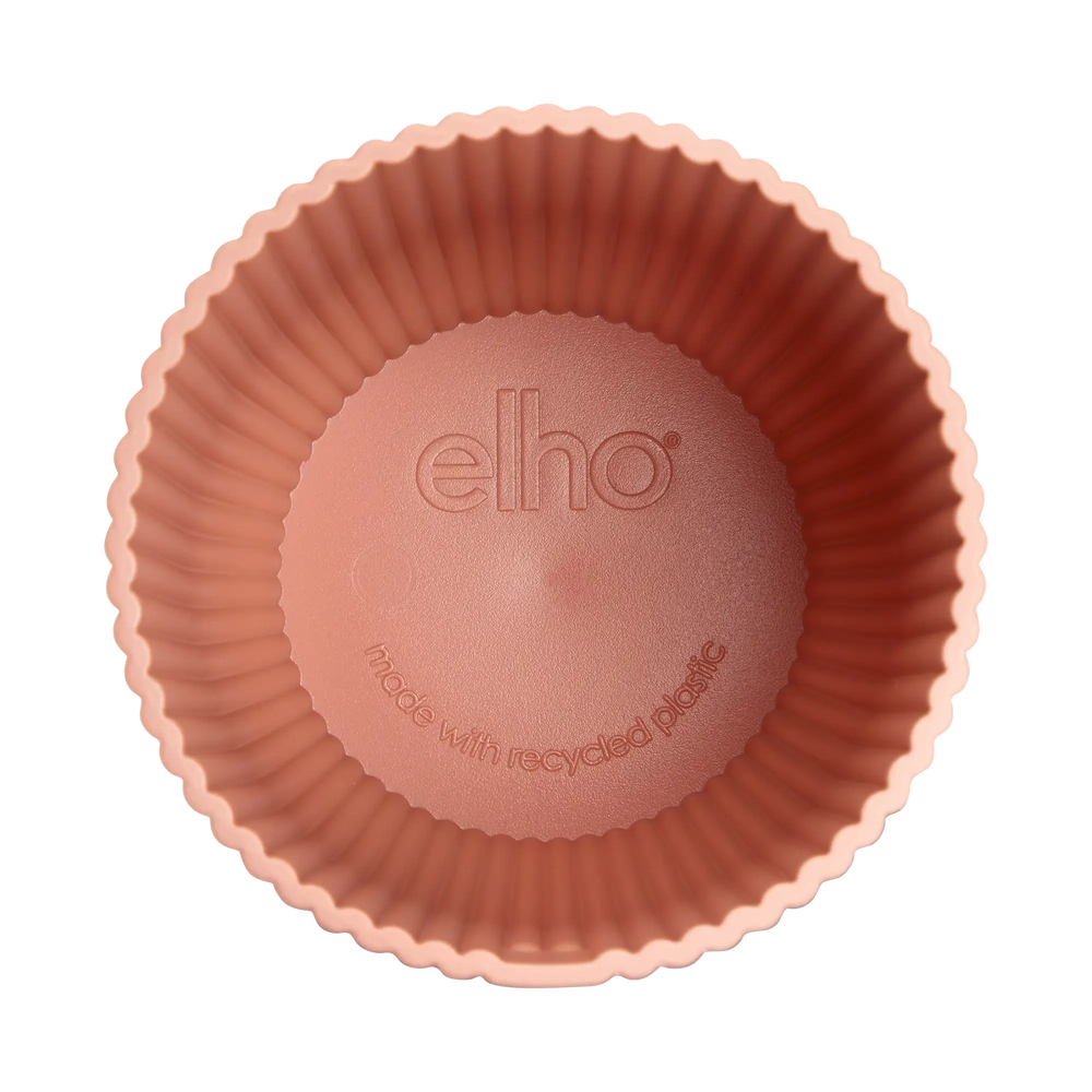 Ronde mini bloempot, delicate roze, binnenkant met elho-opdruk en tekst.